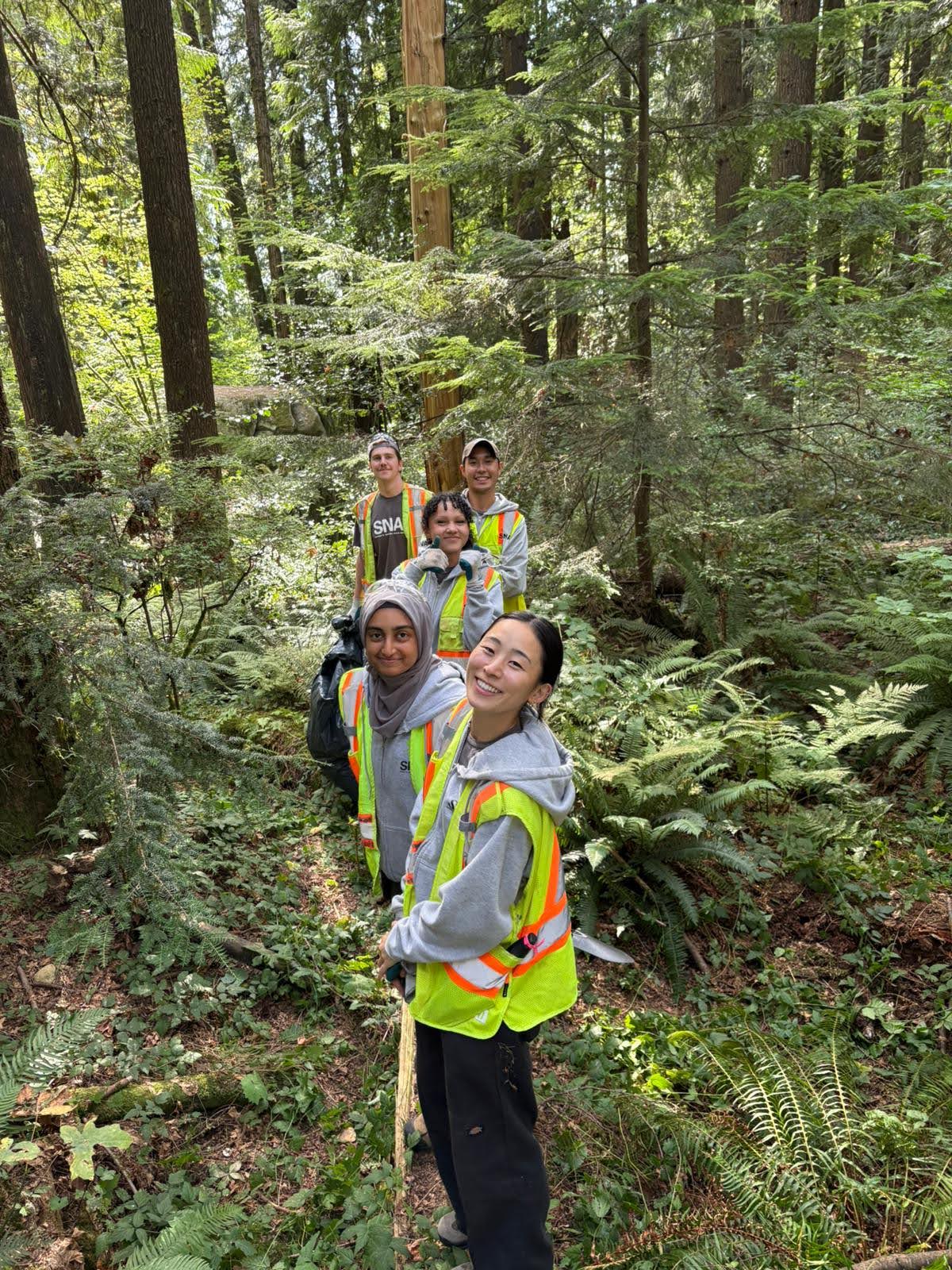 Volunteers planting native trees at Green Timbers Urban Forest